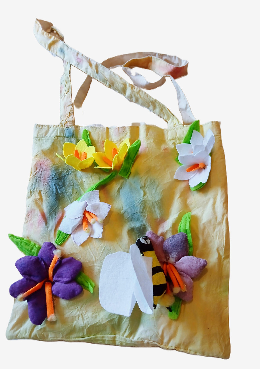 Tote bag with floral decorations on a white background