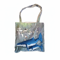Front of bag with whales design on it